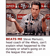 Steve Mariucci of the 49ers is at a loss